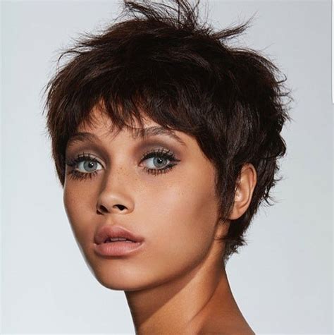 Messy short pixie. Jun 16, 2023 · The classic pixie cut is a chopped style defined by the strands on the back and sides being cut short and with more length on top. However, you can opt for a much shorter version to create a very low-maintenance finish. You can also adapt your pixie by adding a fade or bold color. 3. Classic Short Pixie. 
