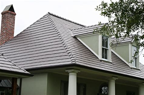 Metal roof that looks like shingles. JINHU shingle stone-coated metal roof tile perfectly replicates the appearance of asphalt shingles, combining the aesthetics of asphalt shingles and the ... 