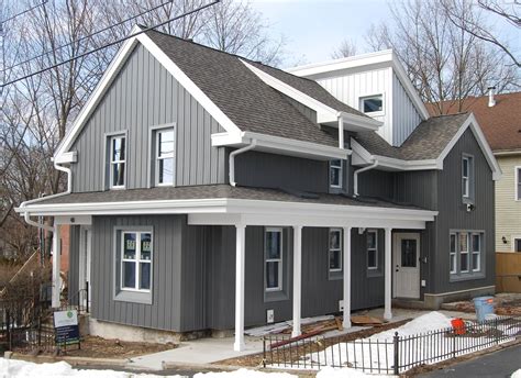 Metal siding for houses. Apr 9, 2020 · 1. Stacked Styles. This home is broken up vertically by the wrap-around porch and the roof overhang that covers it. So, it makes sense that the siding should also be broken up into vertical sections as well, to complete the look and play up the appearance. Metal siding is used in a shingle and panel form, so you get a lot of depth that mixes ... 
