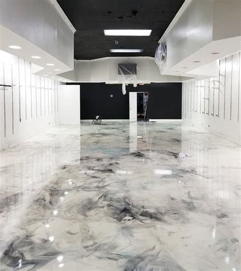 Metallic epoxy floor. Colors may be blended together to create new colors and multiple colors may be applied to any project using a multitude of application techniques. Priced from $2.15 to $2.80 per square foot. Floor Area. Choose an option 250 sq. ft. 500 sq. ft. 750 sq. ft. 1000 sq. ft. Color. 
