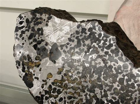 The slice of Pallasite meteorite came from an Admire meteorite which was discovered in 1881 in Kansas by a farmer plowing a field. It's named after the city .... 
