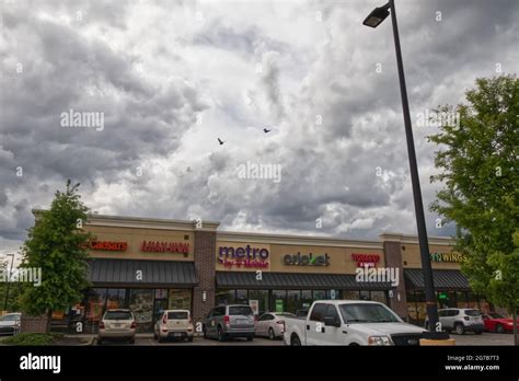 Download this stock image: Augusta, Ga USA - 04 15 21: Urban strip mall Metro PCS Cricket wireless various retail stores ... Download this stock image: Augusta, Ga USA - 04 15 21: Urban strip mall Metro PCS Cricket wireless various retail stores - 2G7B7T3 from Alamy's library of millions of high resolution stock photos, illustrations and vectors. Save …. 