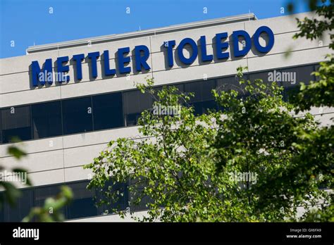Company profile page for Mettler-Toledo International Inc including stock price, company news, executives, board members, and contact information