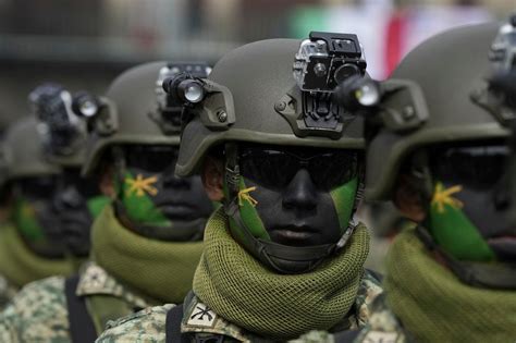 Mexican army sends troops, helicopters, convoys in to towns cut off by drug cartels