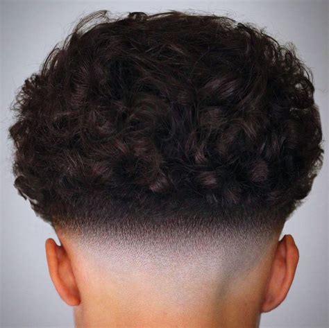 Jul 31, 2023 · The drop fade cut gives the curls a lighter and softer texture, which is ideal for men with heavier curly hair. Additionally, the combination of the drop fade and curls creates a unique and stylish look that can be seen from any angle. See more curly hair fades. High Drop Fade High Drop Fade. A drop high fade is an edgy haircut that utilizes a ... . 
