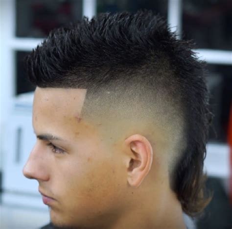 This first hairstyle is great for men with wavy hair. In the photo above, they have a dope fade mohawkthat goes all around the hair, and the top is a bit longer and shows off the natural waves in the hair. 2. Caramel Dyed Burst Fade Haircuts. Source. This is a wonderful example of how to dye just the hair in the mohawk.. 