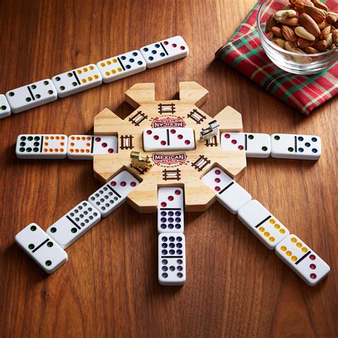 This complete Mexican train double 12 dominoes with pips/dots set comes in a handy wooden box. It includes everything you need to play Mexican train dominoes. Classic Double 12 Dominos . Bright and easy to read 91 professionally sized double 12 acrylic domino tiles. Each tile measures 2 x 1 x 0.4 inch (5.2 x 2.5 x 1 centimeter).