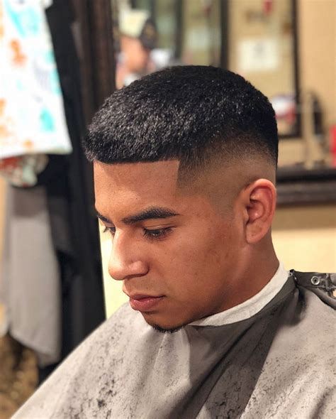 Mexican with buzz cut. 1. The “Induction” buzz cut. This is the shortest, most uniform kind of buzz cut hairstyle, made famous by the military. They shave their recruits’ heads all the way down upon induction into ... 
