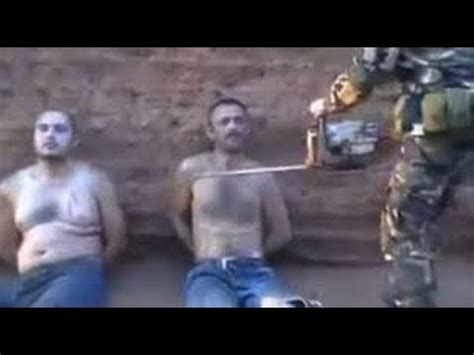 Mexico chainsaw gore. 2 Guys 1 Chainsaw is a shock video filmed by the Gulf Cartel in 2011. In the video, a man and his uncle are interrogated and promptly decapitated. The names of the victims are Félix Gámez García (sitting on the left) and Bernabé Gámez Castro (uncle of Félix, sitting on the right), and both men worked for the Sinaloa Cartel. 