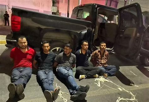 Mexico says a drug cartel kidnapped 14 people from towns where angry residents killed 10 gunmen