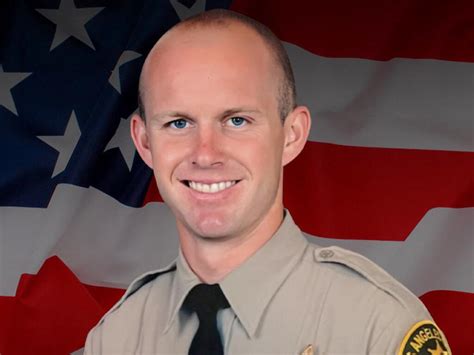 Miami Dolphins honor slain L.A. County Sheriff's Deputy Ryan Clinkunbroomer