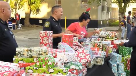 Miami-Dade Schools Police spread cheer with toy giveaway