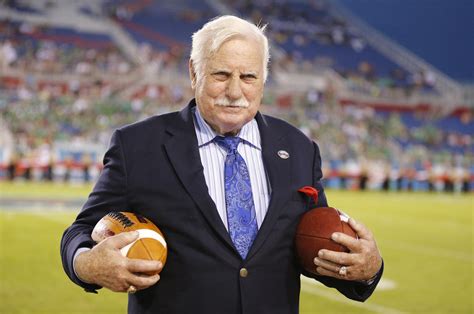 Miami-Louisville winner will receive a trophy recognizing Howard Schnellenberger. Boots included