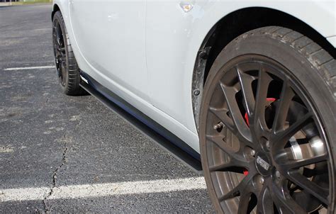 Miata side splitters.  Verus Engineering set out to not only make something aesthetic...