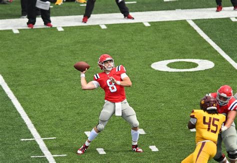 Michael Neel and Cole Dow each rush for 2 TDs as Dayton beats NAIA-member Taylor (Ind.) 52-20