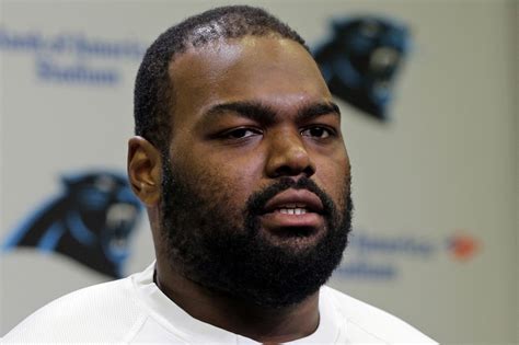 Michael Oher, subject of 'The Blind Side,' says he wasn't adopted, report says