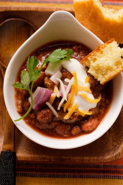 Michael symon chili. Directions. In an 8-quart saucepan, heat 1 tablespoon of olive oil over medium heat. Add the coriander and cumin seeds and saute until fragrant, about 2 minutes. Add the ginger, onion, and ... 