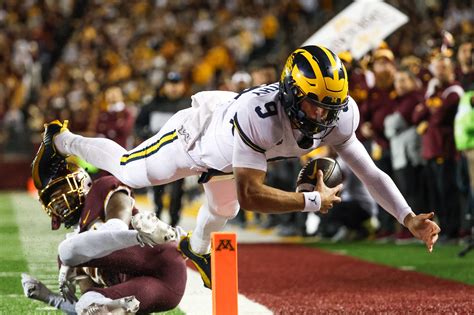 Michigan mauls Gophers in a 52-10 rout as U drops to .500 on season