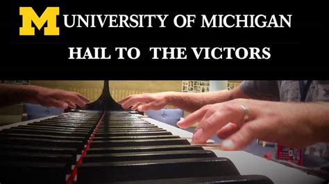 Michigan university fight song. Michigan Wolverines football fans singing "The Victors" at a game on the road against Penn State.Hail! to the victors valiantHail! to the conqu'ring heroesHa... 