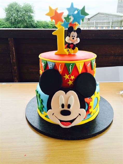 Mickey birthday cake. Mickey Mouse and Minnie Mouse enjoy a celebratory moment with Magnolia Jackson on Wednesday during a Walt Disney World Resort celebration of Jackson’s … 