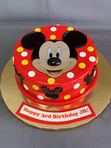 Mickey mouse cake mickey mouse. The cakes are generally very colorful and bright in appearance. They may bear only the face of Mickey Mouse, or the entire figure of Mickey may appear along with some other shapes and images. Sometimes the top of the cake may be adorned with small dolls of Mickey Mouse, along with other decorations such as small houses, bushes or … 