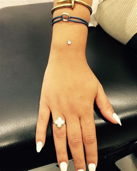 Microdermal piercing wrist pictures. Find 3+ Hundred Micro Dermal Pier...