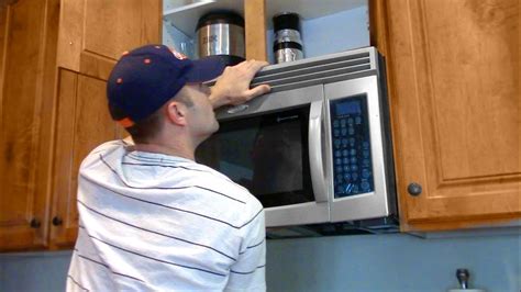 Microwave installation. Slide the microwave onto the mounting plate. You should hear a clicking sound when it’s in place. Secure the microwave to the mounting plate using the screws provided. Make sure the microwave is level and properly secured to the mounting plate. 