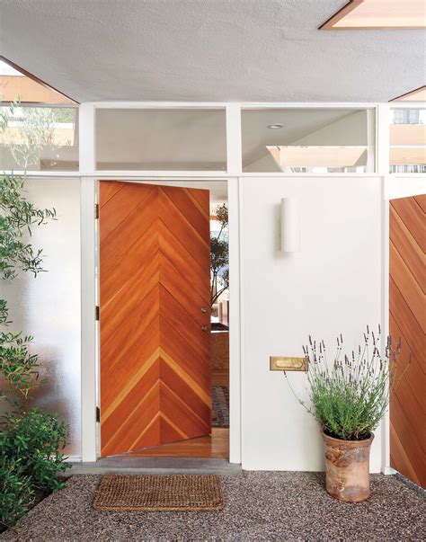 Mid century door. Midcentury modern front doors are gutsy, confident, and guaranteed conversation starters. So needless to say, when designing your retro entry, you should feel anything but shy — and this yellow front door spotted by Andrea of Salty Canary is a show-stopping example. 8. Be brave with a modern update. 
