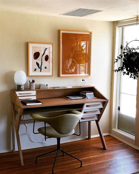 Mid century modern office. Check out our favorite mid-century modern office ideas below – because everyone knows you work better in a pretty space, right? Choose a Chunky Wooden Desk To create a killer mid-century modern office, pick out a warm-toned wooden desk with long, tapered legs. 