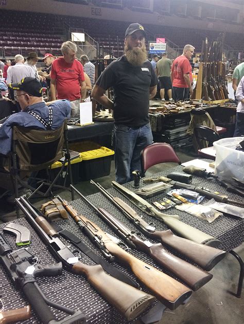 Hundreds of Tables of Guns, Ammo, Knives, Hunting and Shooting Supplies in Cool Air-Conditioning!. 