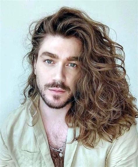 Mid length long hair perm guys. Apr 20, 2024 · This look works well with long or medium-length hair. The high fade helps you make your perm the centerpiece. This look is a perfect way of highlighting your perm as well as your face. 41. The Brushed Back Perm Source: The Right Hairstyles. This perms on guys cut allows you to keep your hair out of your face. 