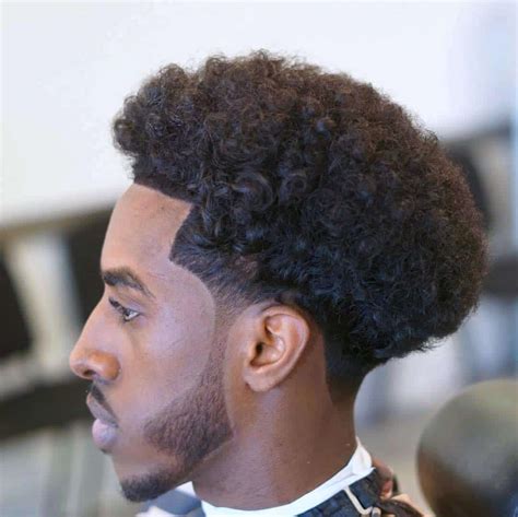 Whether you have tight coils or loose waves, the mid taper fade can e