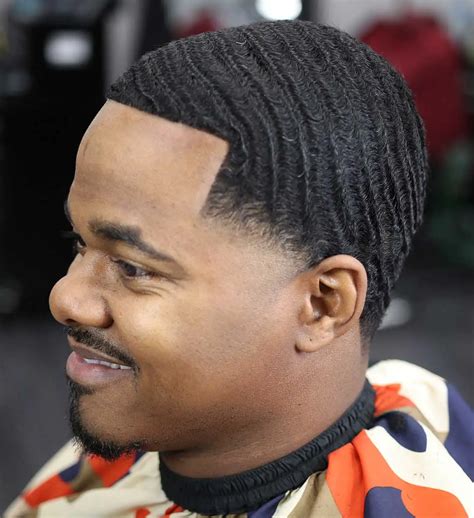 Mid taper fade waves. Low Fade vs Taper Black Male. A low fade usually involves cutting the hair very short around the head, which ends above the hairline. On the other hand, the taper is a refined version of fade, featuring a gradual transition from long to short hair on the sides and back of the head. Black males prefer both types of haircuts as a choice suited to … 