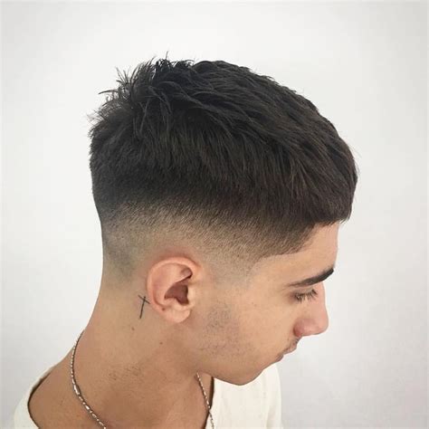 The burst fade is a popular fade haircut for men. The burst fade tapers the hair around the ear and down the neck for an all-around fade. Like the drop fade, the burst fade haircut is generally combined with a mohawk hairstyle for an edgy, bold look. However, the burst taper also styles nicely with a trendy comb over, faux hawk, curly top .... 