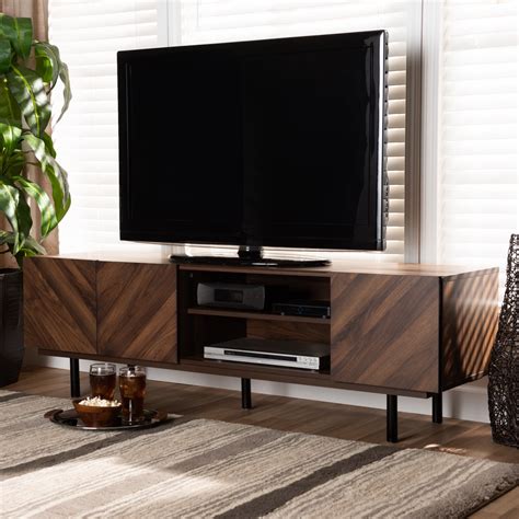Mid-century modern tv stand. A black TV stand fits a variety of décor, from minimalist to modern. TV stands are also made from different materials. A glass TV stand can enhance a contemporary space, ... Plus, these more closely resemble furniture pieces with styles ranging from modern farmhouse to mid-century to rustic TV stands. You can also find a TV stand with mount, ... 