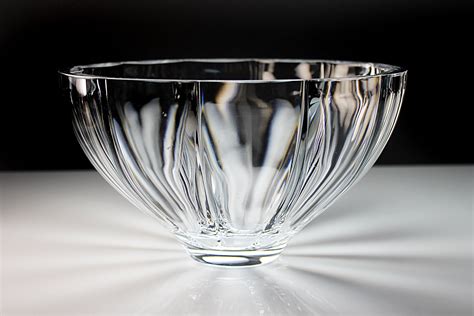 Mikasa crystal fruit bowl. The beautiful, clear crystal body is designed with a contemporary twist, which creates an eye-catching optical effect, whether the bowl is displayed on its own or used for potpourri, candy, and more. Measures 11 inches in diameter by 4-1/2 inches high with a 2.5 QT capacity. Dishwasher safe. . 