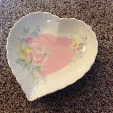 Mikasa heart shaped dish. Mikasa Blue Daisies butter dish. $19.00. Vintage Mikasa Heritage Old Tapestry dinner plate lot of 3. $26.60. Mikasa lidded trinket dish - a special thank you. $18.00. VTG Mikasa premiere Colorama “Evening Song” Dinner Plates. $14.00. Vtg Mikasa Heart Shape Trinket Tray. 