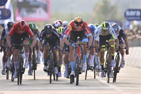 Milan sprints to win crash-affected Stage 2, Evenepoel leads