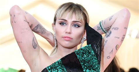 Miley Cyrus Tattoo Guide: Photos of Her Body Ink, …