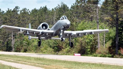 Military aircrafts exercise landing and reloading in Michigan