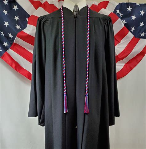 Military Honor Cords. Graduating students who have served in, are currently serving in, or are commissioning upon graduation into the military are permitted to wear red, white, and blue honor cords as part of their Commencement regalia. We proudly recognize these students and their service to our country.. 