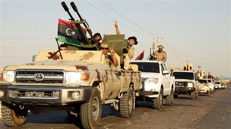 Militia clashes rock Libya’s capital, leaving civilians trapped, health ministry says