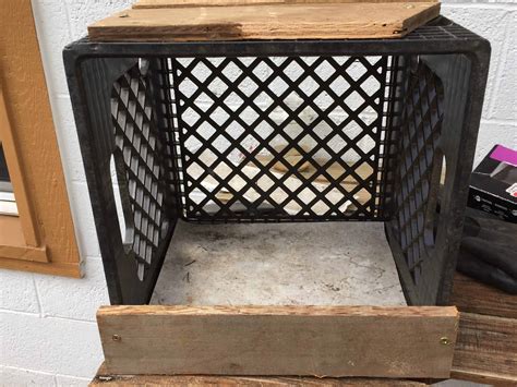 Make a nesting box for your chickens out of used milk crates. It'