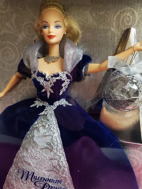 Description. Millennium Princess™ Barbie® doll is dressed in a magnificent royal blue velvety gown with shimmering organza and silvery glitter lace cascading down the front. …. 