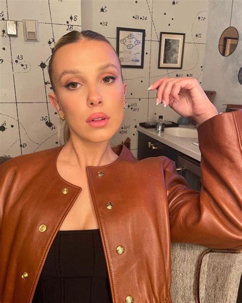 Millie bobby brown jerk off. It might be almost December but Millie Bobby Brown is ready for a tropical vacation. The Stranger Things star shared an adorable carousel of photos on Instagram. "Solar power," she captioned the Nov. 25 post. She wore high-waisted dark denim shorts, a red, white and blue striped bikini and a collared shirt that was cropped above her chest. 