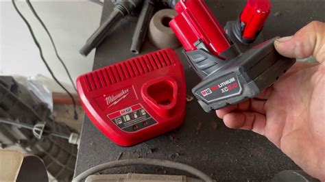 Milwaukee m12 battery charger flashing red and green. If you have a Milwaukee M18 Battery that will not fully charge, or is dead, but the charger says it is full, you need to try this! #milwaukee #diy #batteryLi... 