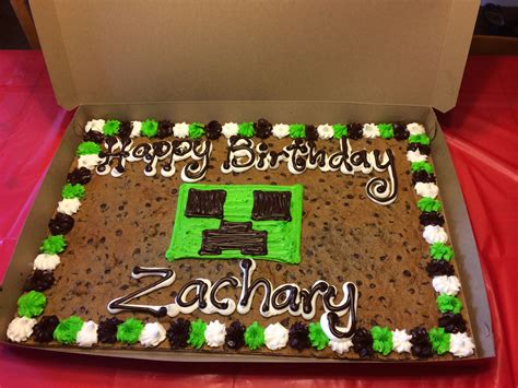 Minecraft cookie cake. 5. Minecraft Cookie Cake. It’s hard to beat an enormous chocolate chip cookie covered in cake icing — except when it’s made especially for you! Decorate your cookie canvas with whatever the birthday kid loves most about Minecraft. 