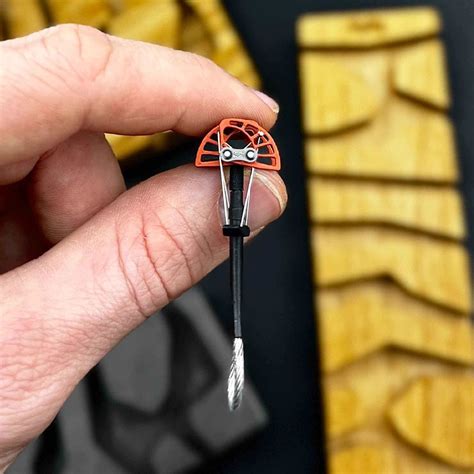 Mini climbing cam keychain.  It’s a fun and practical accessory, adding a to...