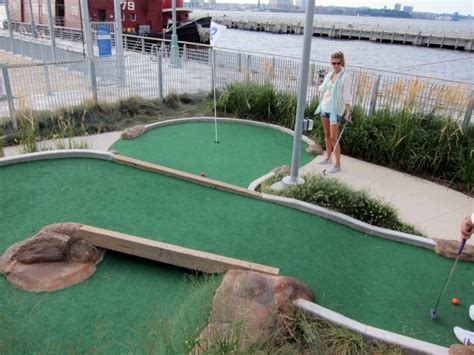 Mini golf manhattan. Ram. 11, 1443 AH ... In June, London-based Swingers will introduce New York to its alcohol- and music-fueled mini-golf experience, which it dubs “crazy golf.” The ... 