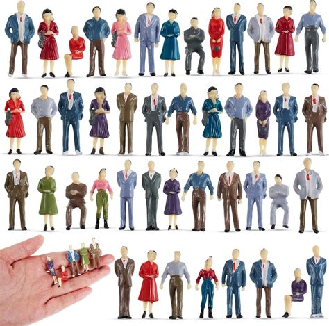 Miniature human figures uk.  Corporate & private commissions for brands such a...